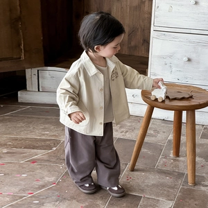 Stylish beige hooded jacket and brown pants outfit for baby boys in spring fashion