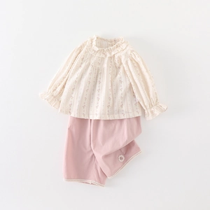 Floral baby girl ruffle shirt and pink trousers set with lace details in pastoral style