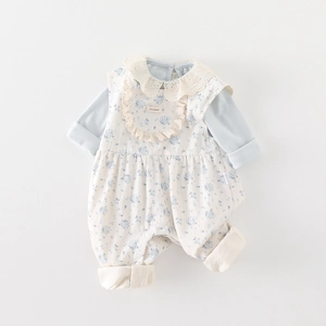 Floral baby girl romper set with blue long-sleeve shirt and handmade lace bib detail