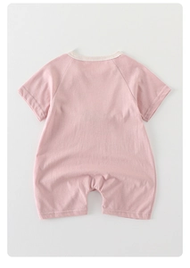 Flat lay of soft pink short-sleeve baby bodysuit with beige ribbed neckline and high-density cotton