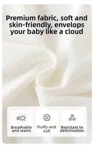 Macro view of white soft knitted cotton fabric showing breathable texture for baby clothing