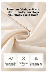 Close-up of soft beige breathable knit fabric for baby bodysuit with smooth texture