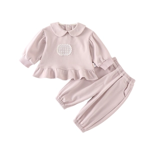 Ensemble deux pièces pour bébé fille avec col Claudine et ourlet à volants rose