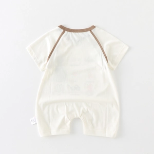 Vista posteriore di un morbido body neonato in cotone crema con maniche raglan scure
