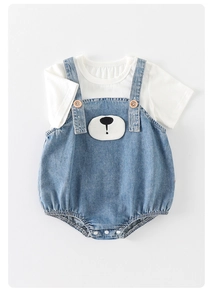 Detailed view of baby denim romper set with cute bear patch and soft cotton T-shirt