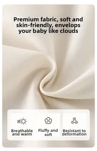 Macro shot of breathable and soft cream-white knitted cotton fabric for kids' apparel