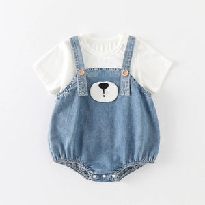 Baby denim jumpsuit set featuring a white cotton top and cartoon bear pattern overall