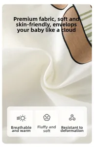Detailed close-up of soft breathable knit fabric on striped newborn cotton romper
