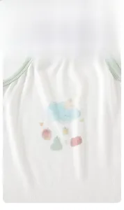 Close-up of baby girl camisole featuring soft cotton ribbed fabric and fruit pattern