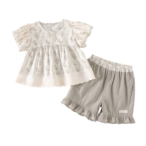 Girls floral cotton set with flutter sleeve top and ruffled shorts in summer style