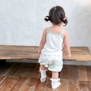 Toddler girl summer set with white ribbed camisole and green floral bloomers back view