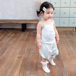 Toddler summer set featuring white strap tank top and mint green printed shorts