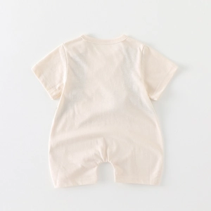 Back view of light beige short sleeve baby romper in soft cotton with snap closures