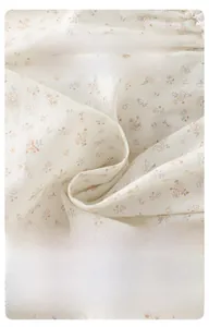 Close-up of soft floral cotton fabric with breathable texture for toddler summer set