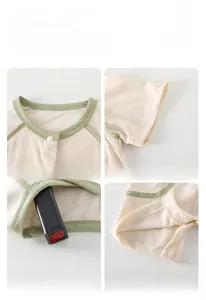 Detail showing non-fluorescent cotton fabric with safe snap buttons for baby rompers
