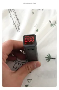 Fluorescence tester showing zero value on cartoon print baby clothes fabric