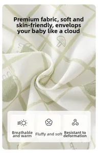 Macro shot of soft white waffle weave baby fabric with cute cartoon mushroom pattern