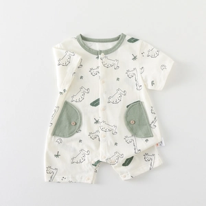 Short sleeve baby romper with green dinosaur print and snaps for infants 0-18 months