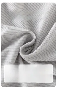 Detail showing soft ribbed grey fabric with a delicate knit texture for baby clothing
