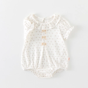 Barboteuse bébé fille à fleurs avec col à volants et détails de nœuds en blanc crème