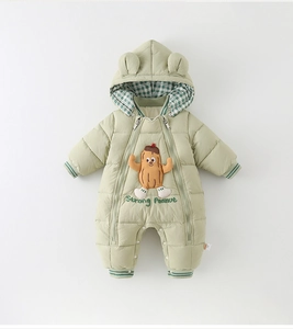 Detailed flat lay of baby green hooded romper with peanut embroidery and plaid lining
