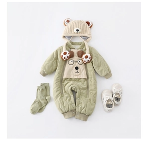 Quilted baby romper set with bear print, knit hat, socks, and shoes for winter warmth