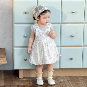 Baby girl floral suspender dress with lace trim and bow accent, sweet summer outfit
