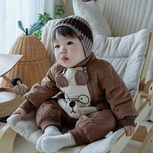 Quilted baby winter jumpsuit in brown with bear pattern and matching striped hat