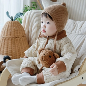 Quilted baby winter romper with bear pattern and matching knit hat for infants