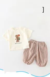 Detail of baby summer set with cartoon bear print T-shirt and striped bloomers, Class A quality