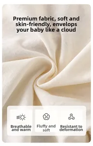 Detailed view of breathable and soft cream knit fabric for newborn summer rompers