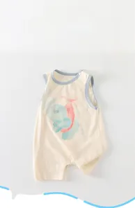 Detail of infant sleeveless cotton romper with elephant print and safety snap buttons