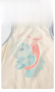 Detail of baby cotton sleeveless romper with cartoon elephant print and contrast piping