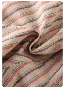 Close-up of striped cotton linen fabric texture with soft pastel colored patterns