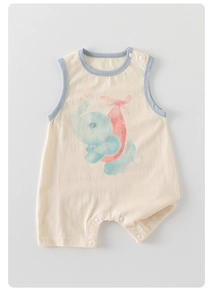 Detail of baby cotton romper with cartoon elephant print and snap button closure