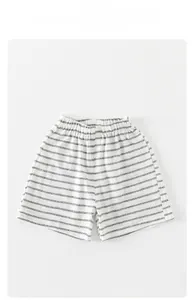 Detailed flat lay of striped baby shorts with elastic waistband for summer wear