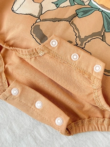 Body bébé en coton avec imprimé ours et boutons-pression pour un change de couche facile