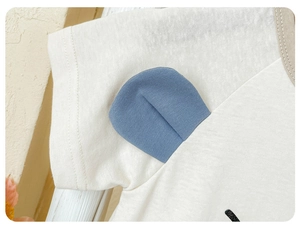 Close-up of baby short sleeve romper with blue 3D ear detail and soft cotton fabric