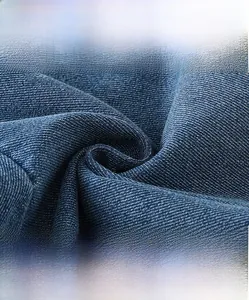 Détail du tissu denim respirant haute densité pour ensemble d'été dinosaure enfant
