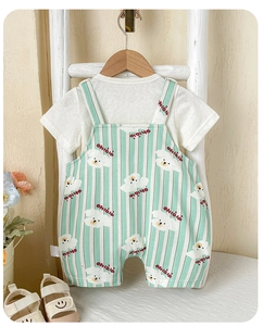 Detail view of infant summer two-piece set featuring a cartoon dog print and striped overalls