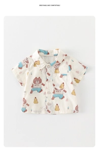 Detail of infant short sleeve shirt with bear and pear prints and front buttons