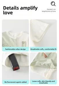Detail of baby romper featuring light green patchwork, breathable fabric and round neck