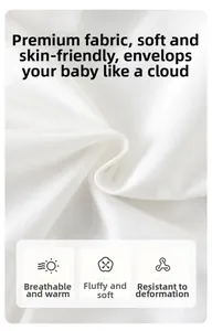 Detailed view of white breathable cotton fabric for baby bodysuits with soft texture