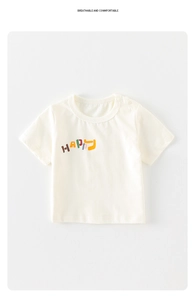Detail of baby cotton t-shirt with happy print and shoulder buttons on white background