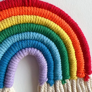 Handmade boho rainbow macrame wall hanging decoration with cotton tassels for nursery