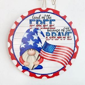 Patriotic gnome wooden door sign with US flag and Land of the Free text for Independence Day