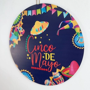 Cinco de Mayo wooden welcome sign with Mexican hat and festive party elements decor