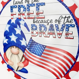 Patriotic gnome wood door sign with American flag and land of the free quote