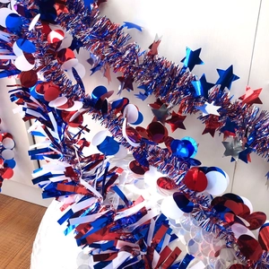 Patriotic red white and blue tinsel garland with stars for 4th of July party decor