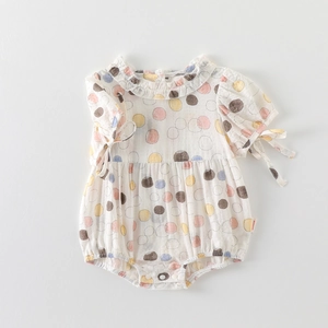 Short-sleeve baby cotton romper with colorful polka dots and ruffle collar details
